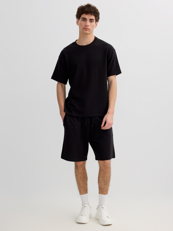 Sports fleece Bermuda with drawstrings black middle front view