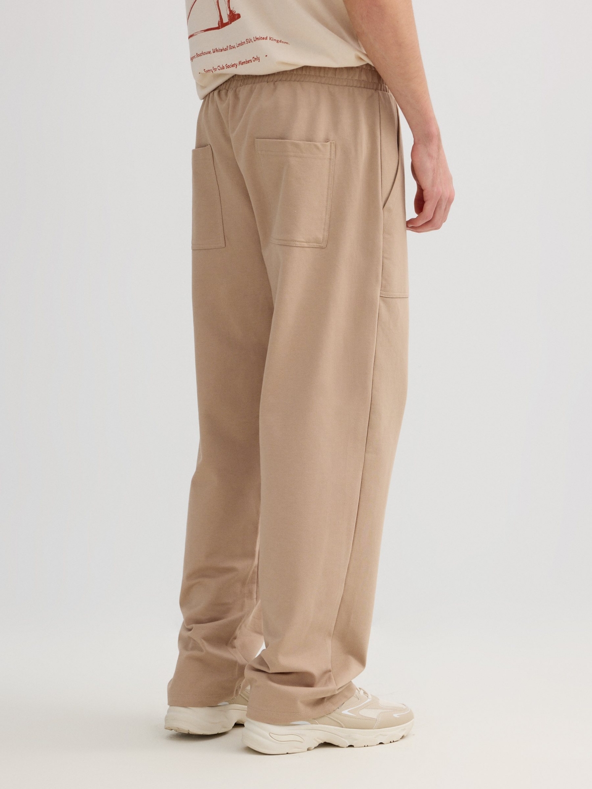 Jogger fleece pockets beige middle back view