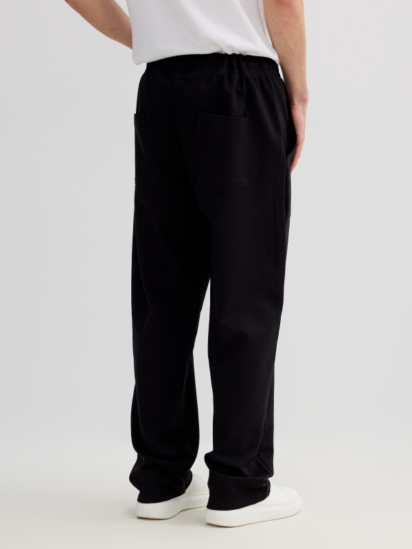 Jogger fleece pockets black middle back view
