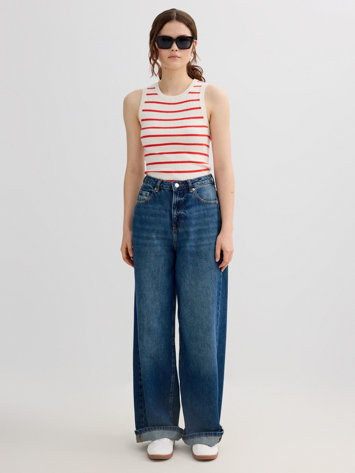 Sleeveless striped knit top coral front view