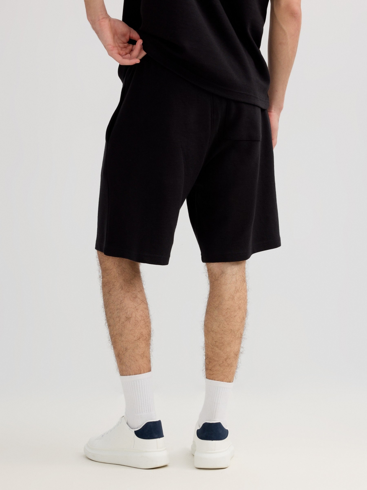 Sports fleece Bermuda with drawstrings black front view