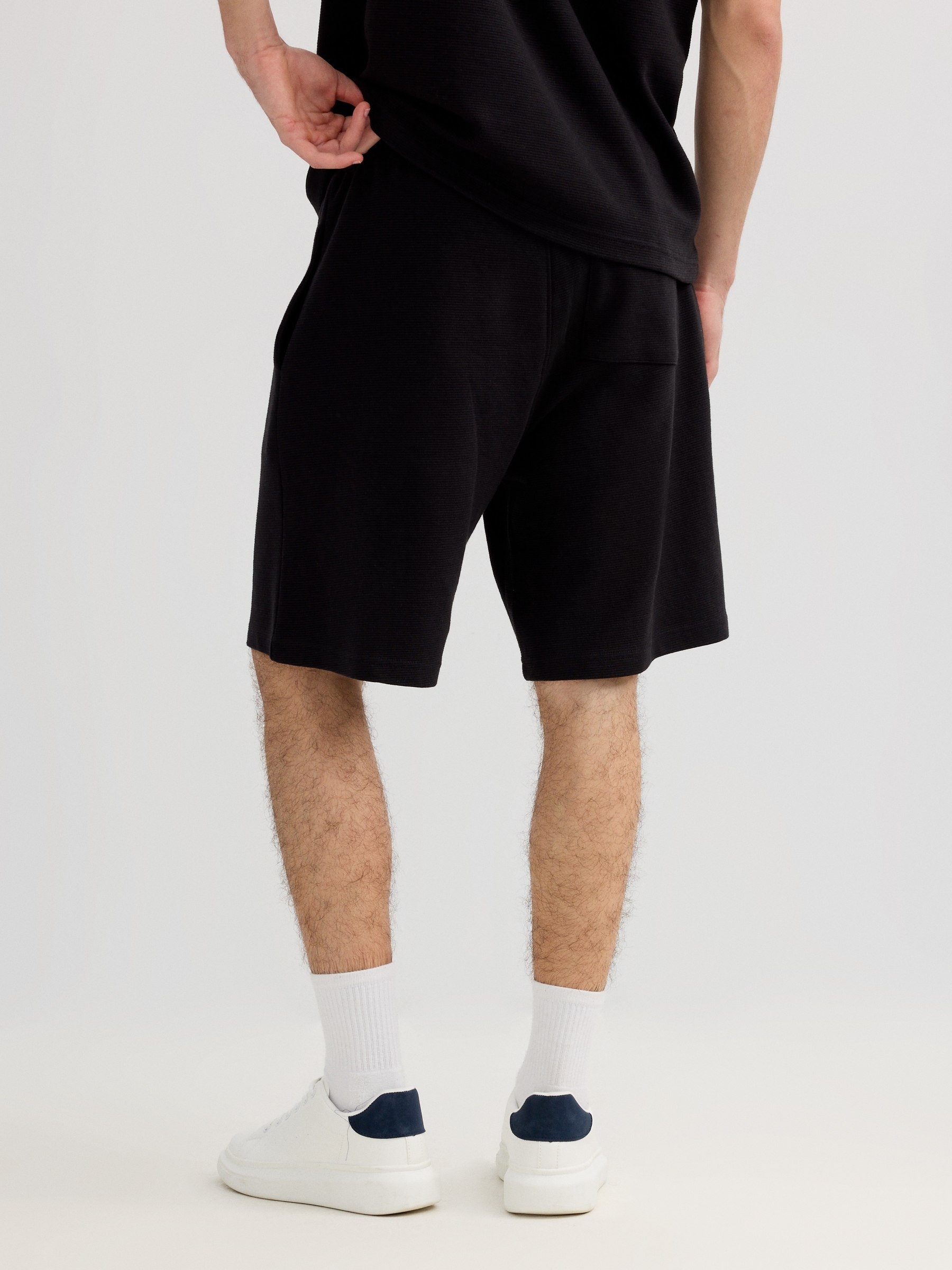 Sports fleece Bermuda with drawstrings black middle front view