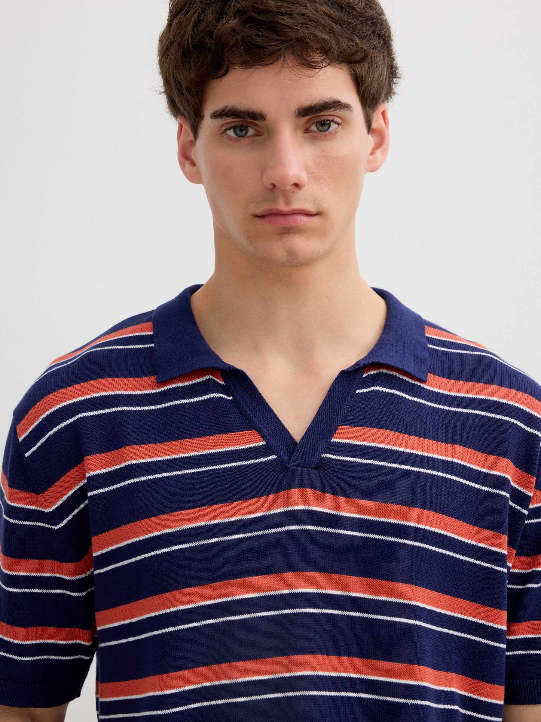 Striped knit polo with classic collar blue middle front view