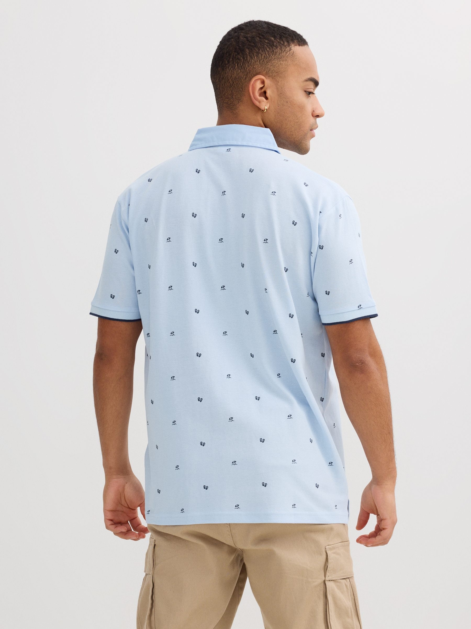 Polo piqué azul con miniprint azul claro vista media frontal