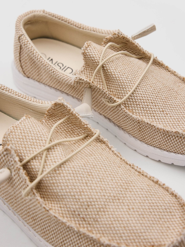 Beige canvas sports sand detail view
