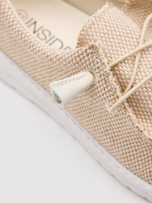 Beige canvas sports sand detail view