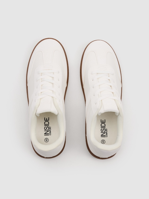 Synthetic leather sports shoes with rubber sole white zenithal view