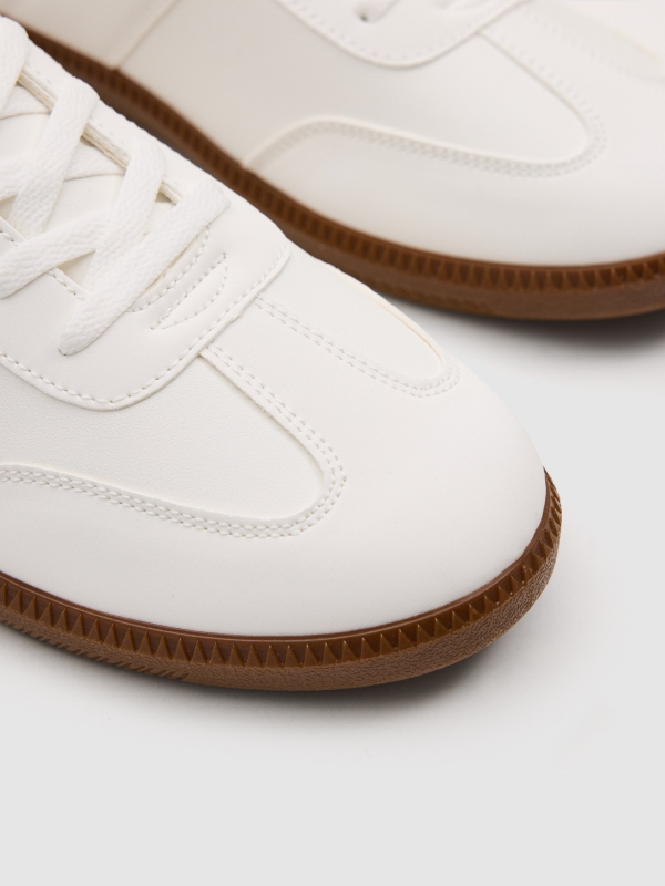 Synthetic leather sports shoes with rubber sole white detail view