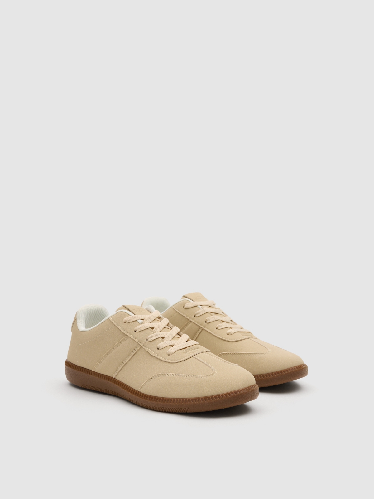Synthetic leather sports shoes with rubber sole beige 45º front view