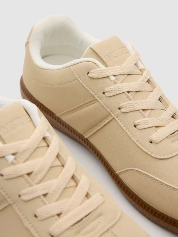 Synthetic leather sports shoes with rubber sole beige detail view