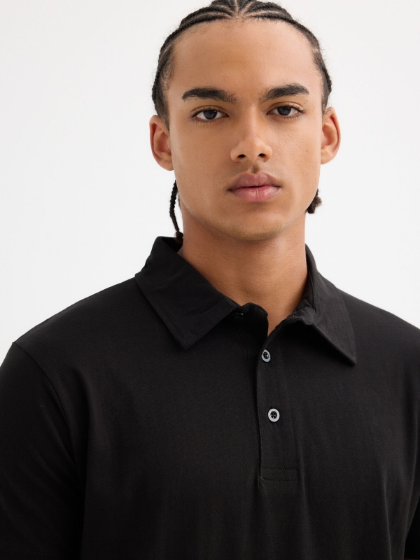 Black basic short sleeve polo black detail view