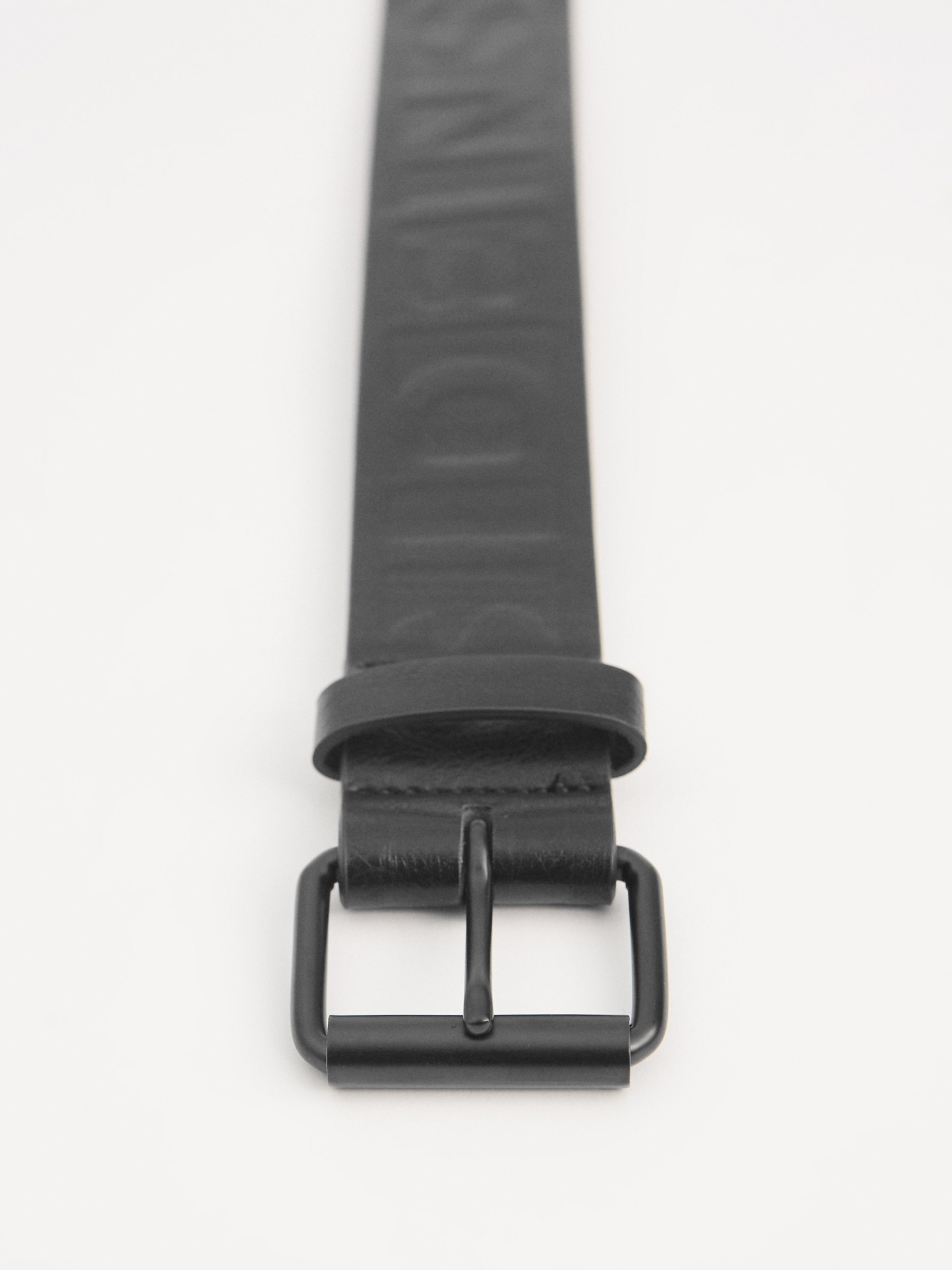 Engraved leather effect belt black