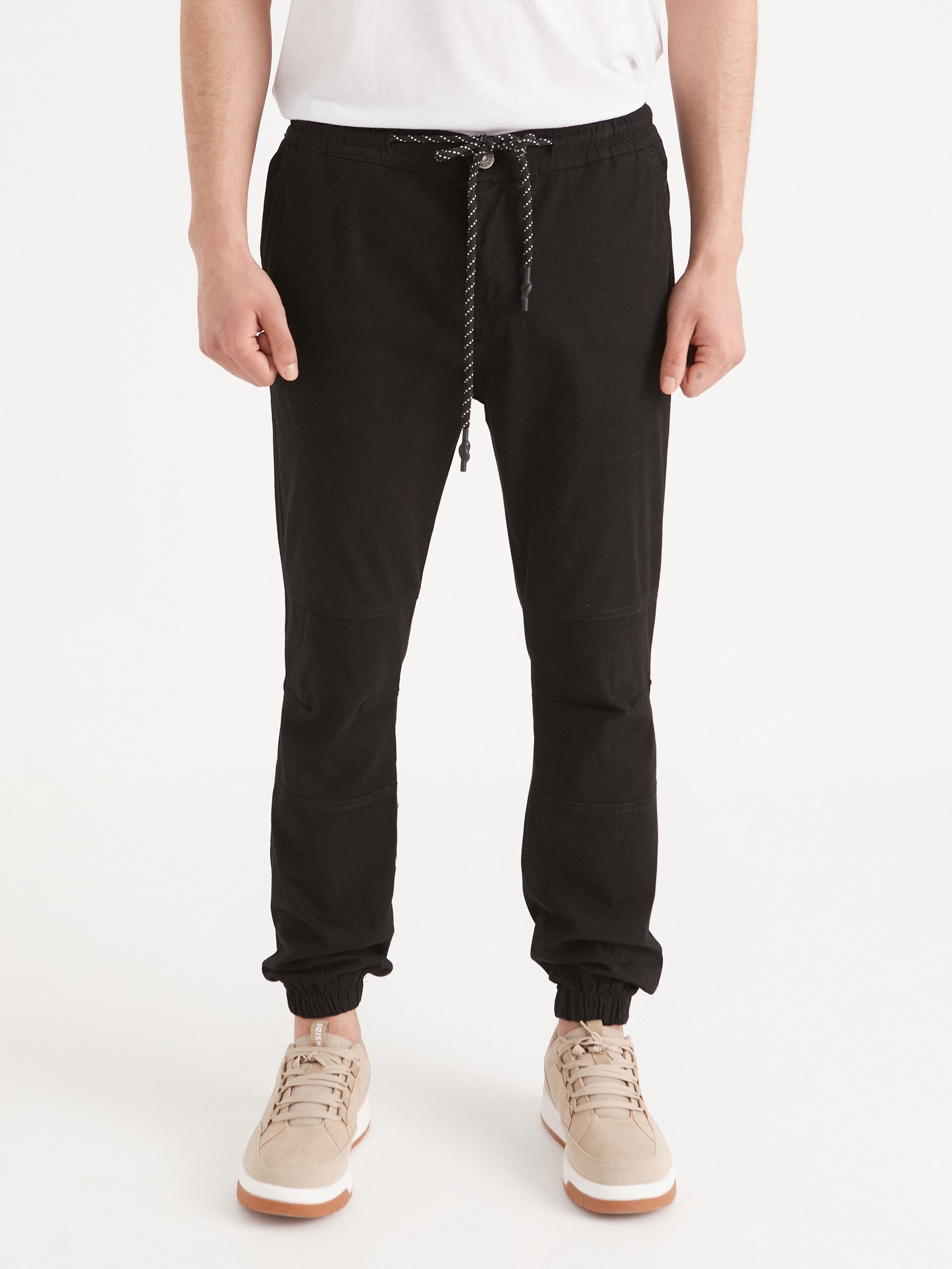 Joggers with seams black front view