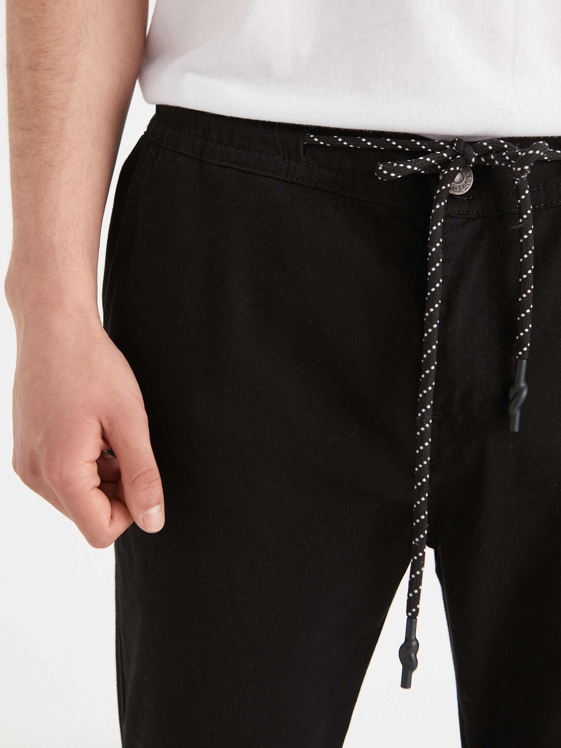 Joggers with seams black front view