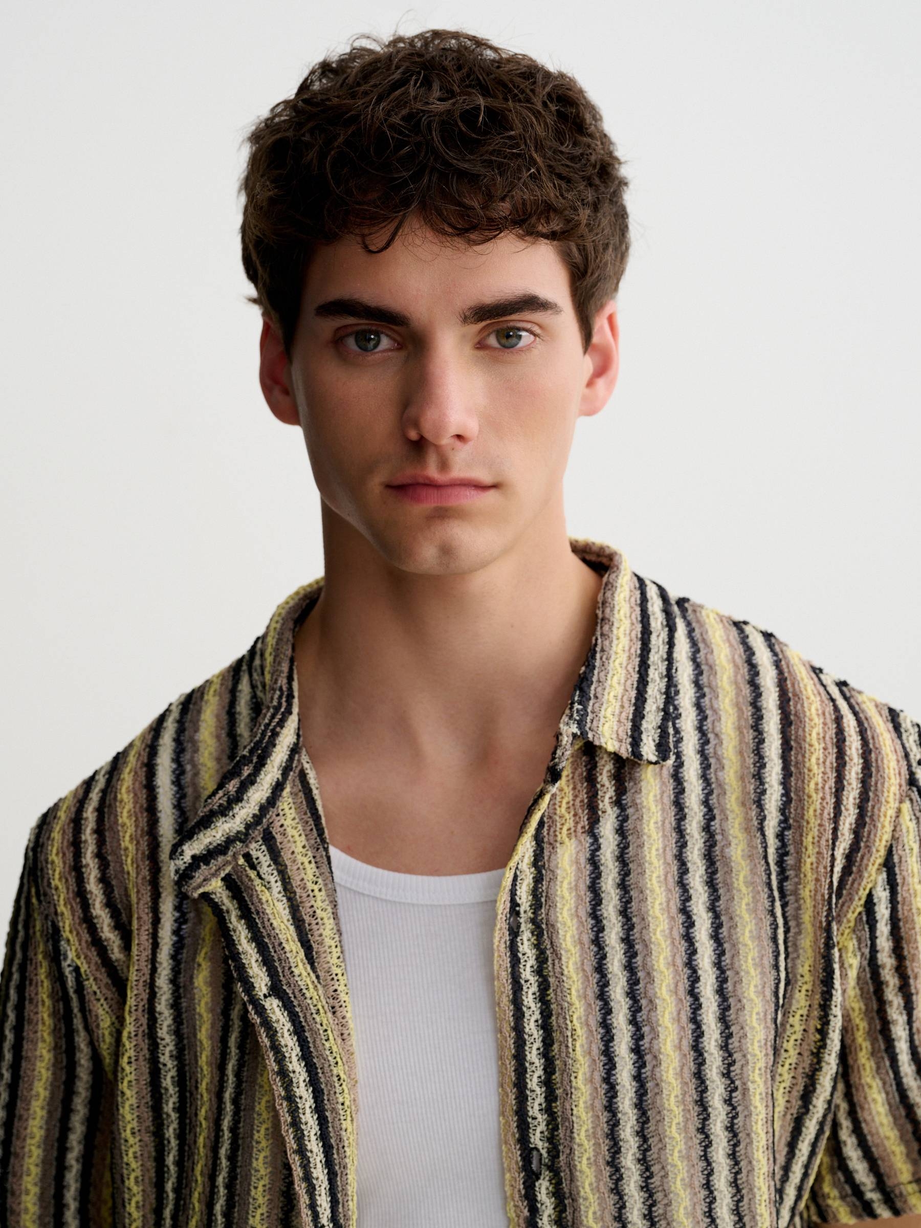 Striped shirt with buttons and classic collar black middle front view