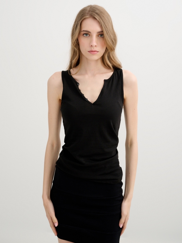 Sleeveless shirt with buttons black middle front view