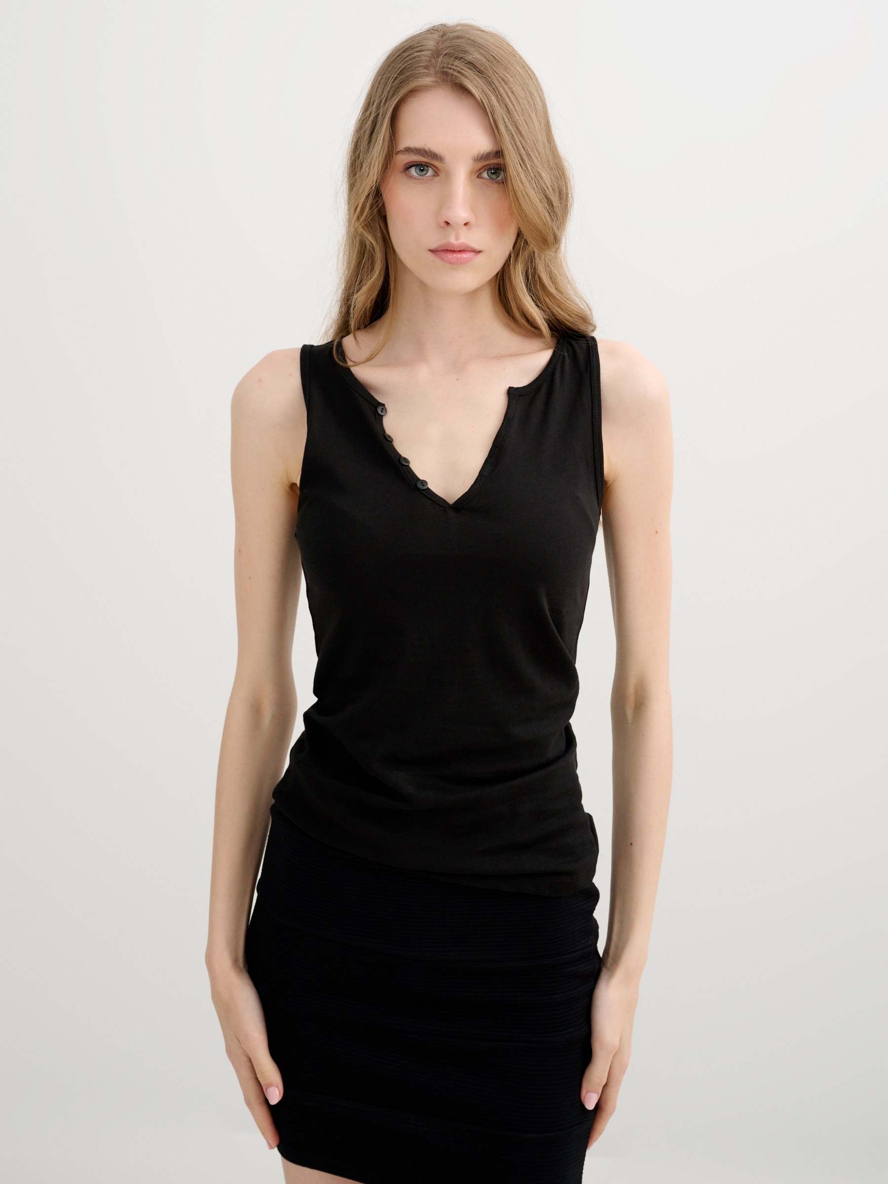 Sleeveless shirt with buttons black middle front view