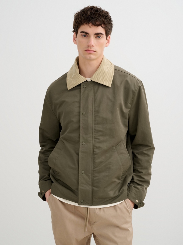 Faux leather effect jacket buttons green middle front view