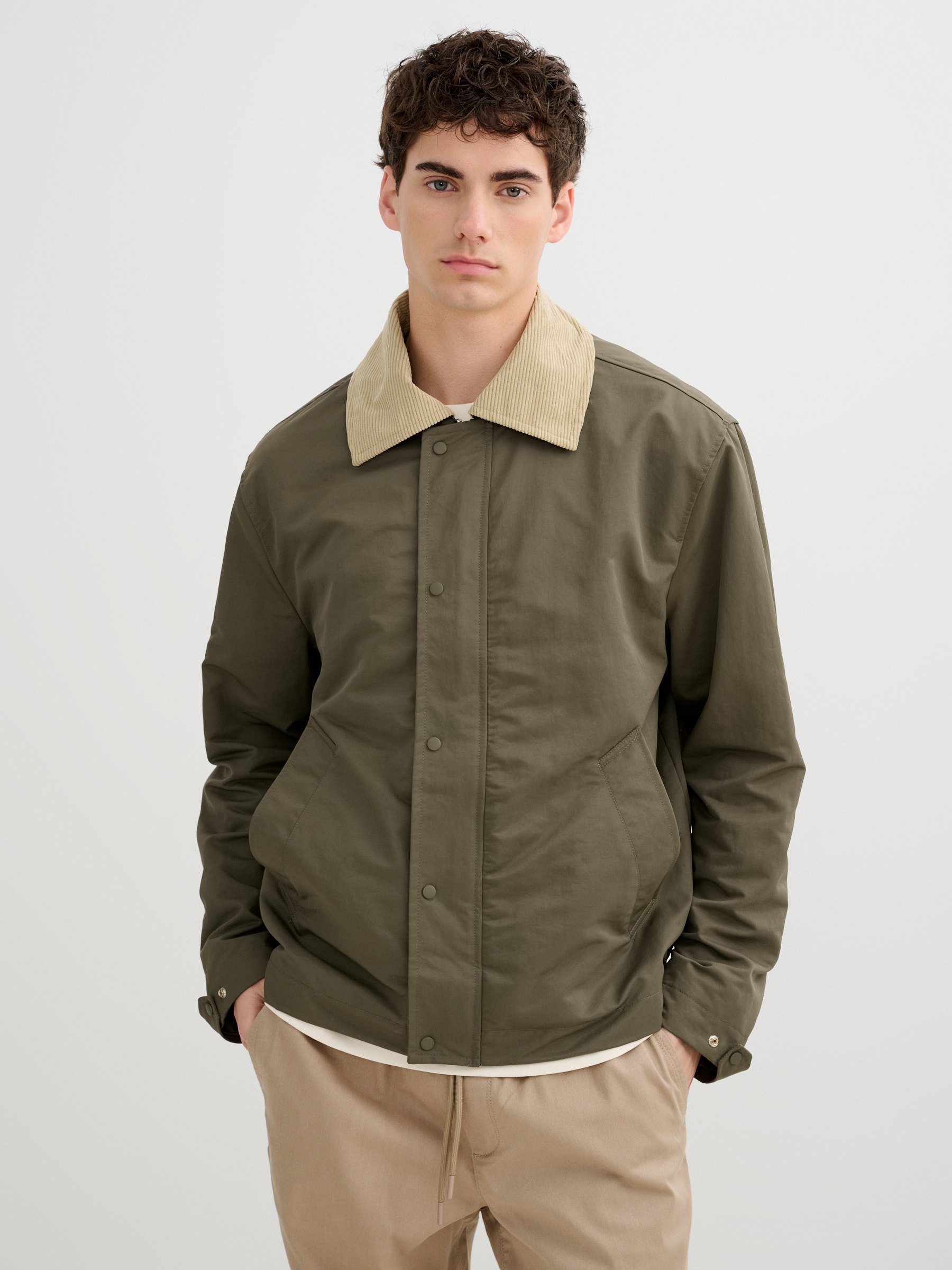 Faux leather effect jacket buttons green middle front view