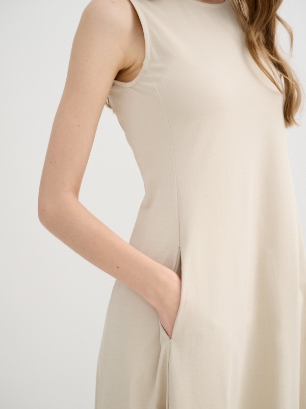 Sleeveless flared midi dress raw detail view