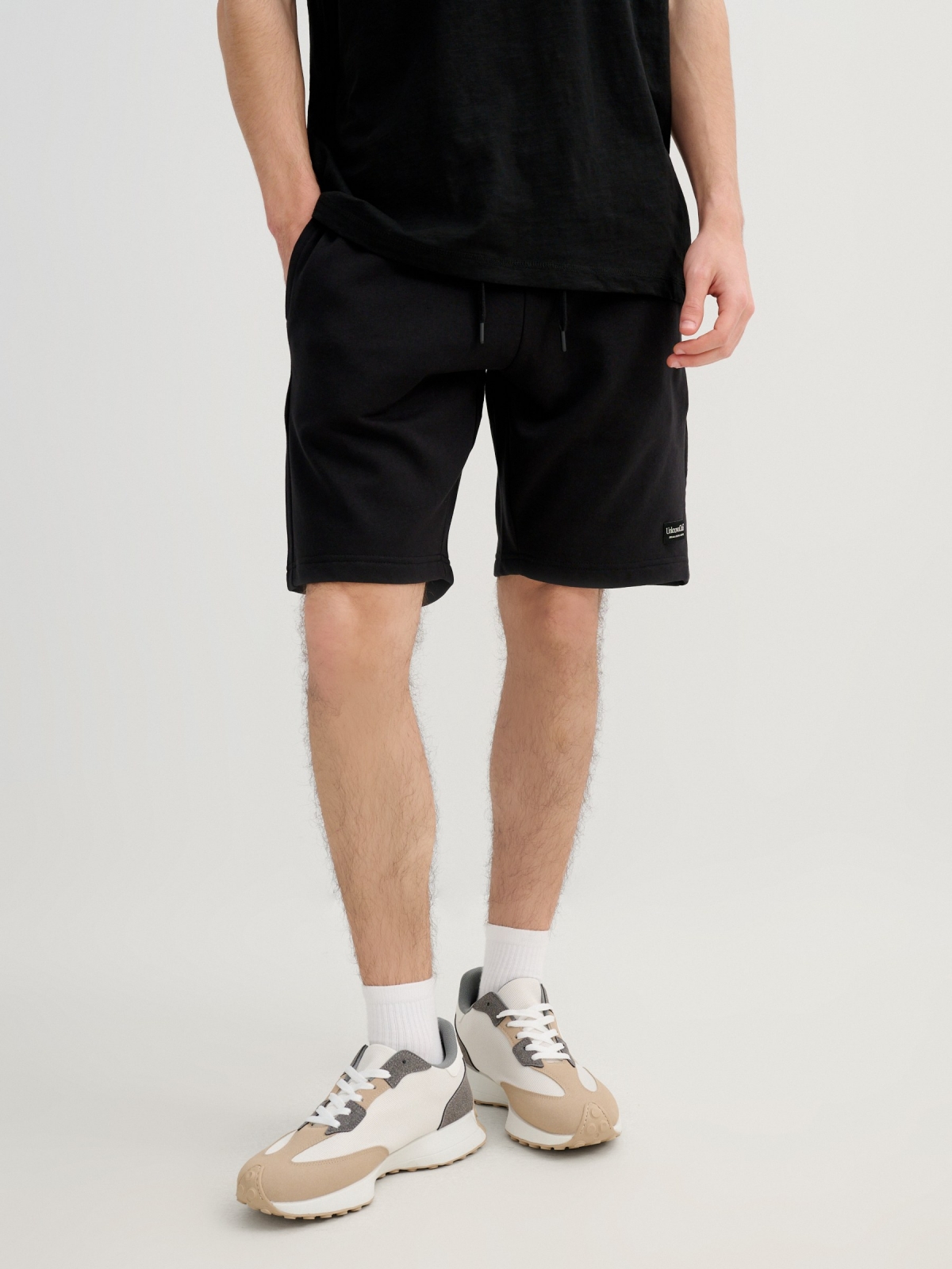 Bermuda jogger with laces black middle back view