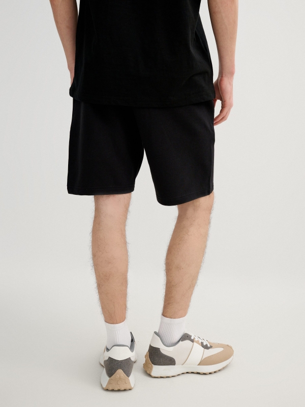 Bermuda jogger with laces black front view