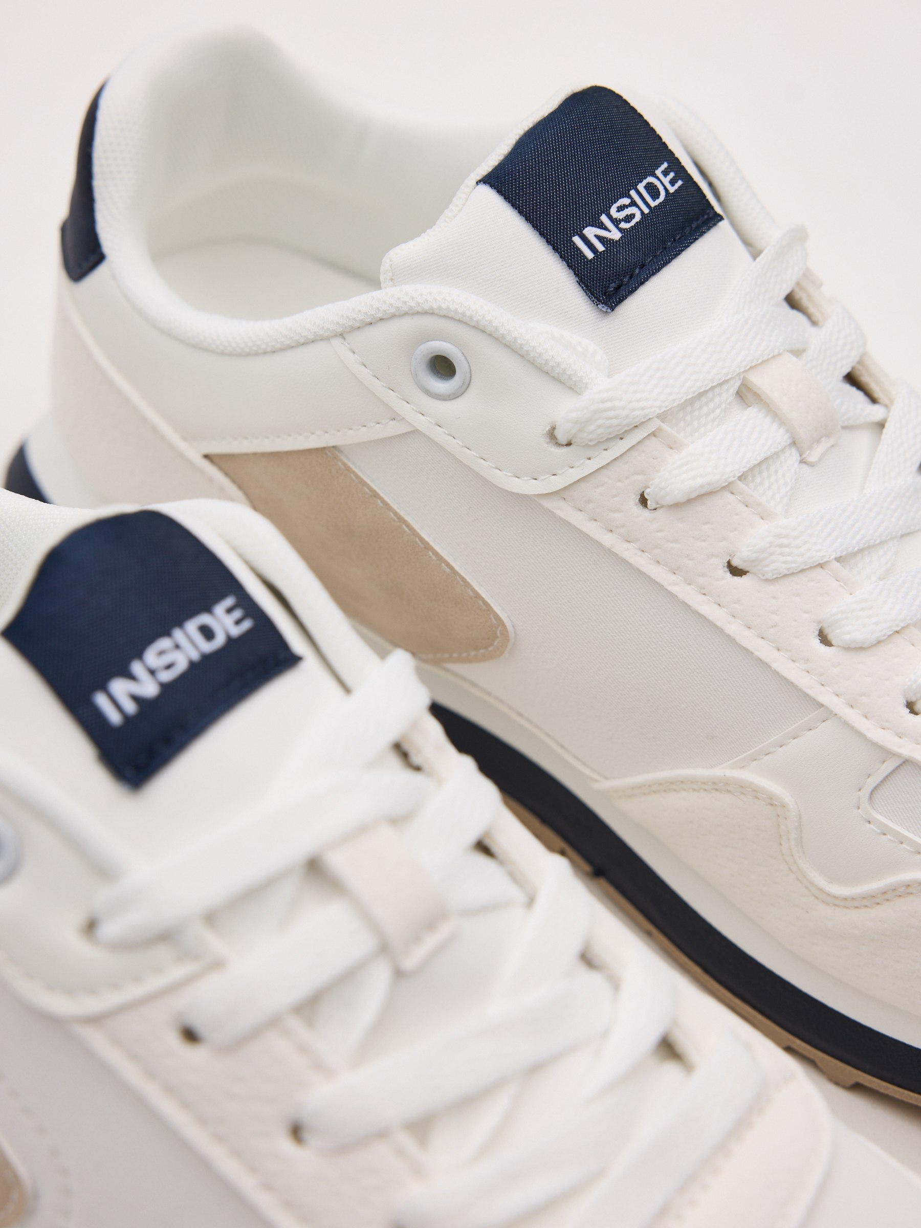 Nylon sports shoes with rubber sole leather effect white