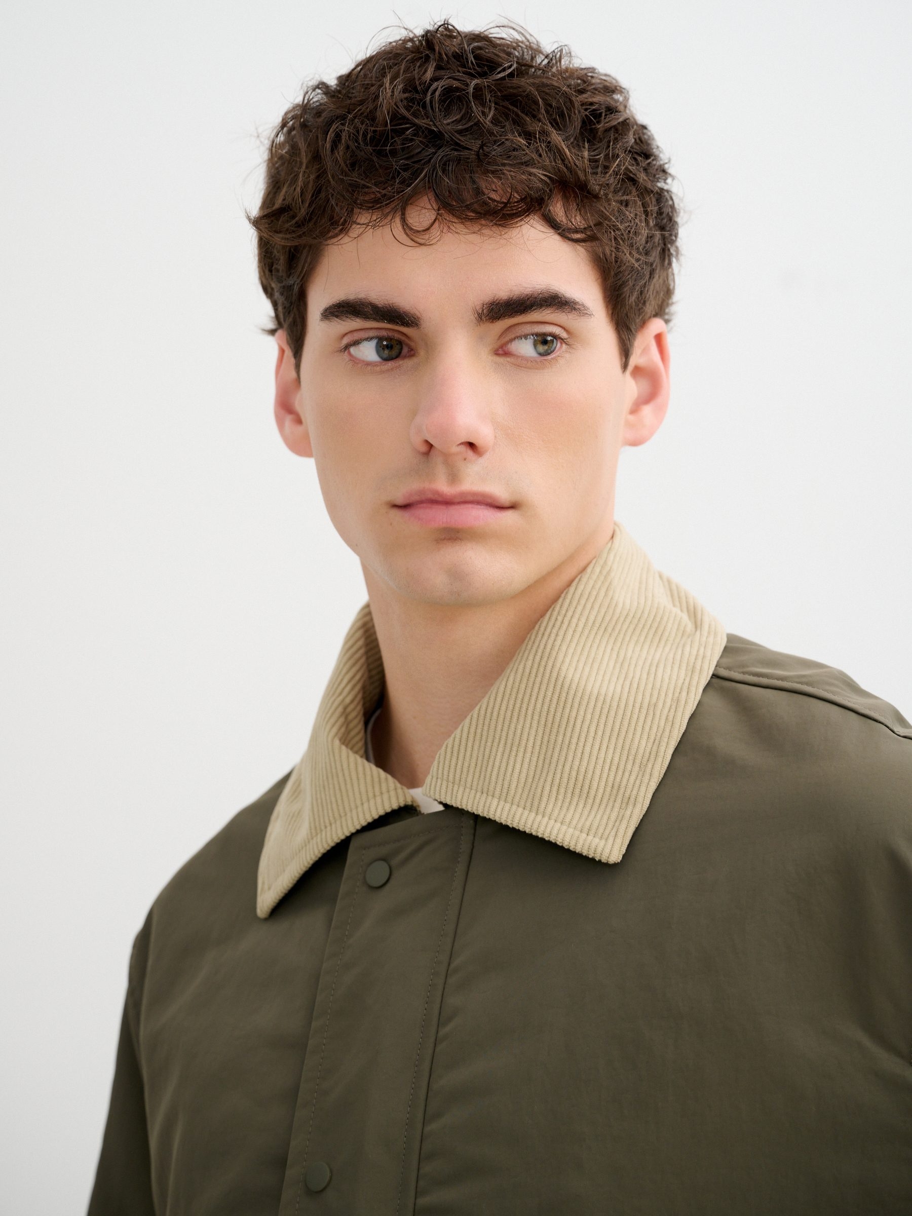 Faux leather effect jacket buttons green middle front view