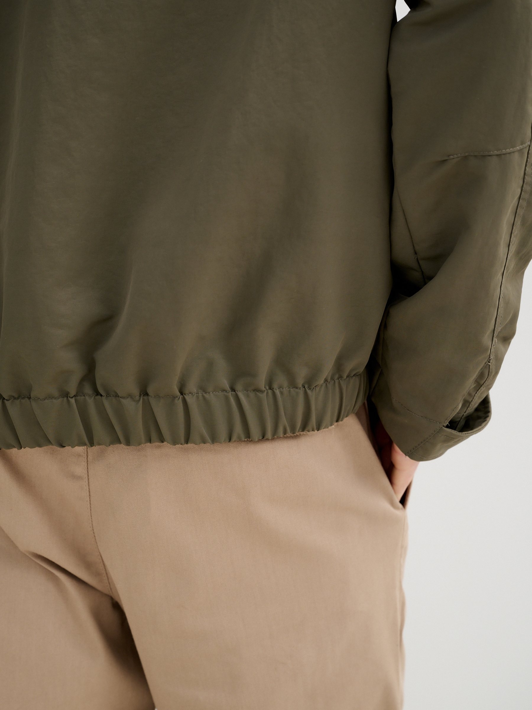 Faux leather effect jacket buttons green middle front view