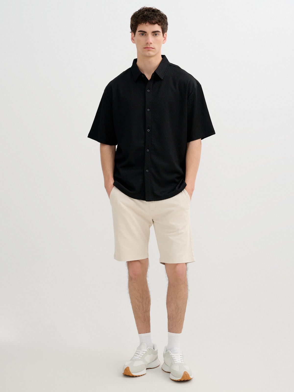 Camisa básica de punto con botones negro vista general frontal