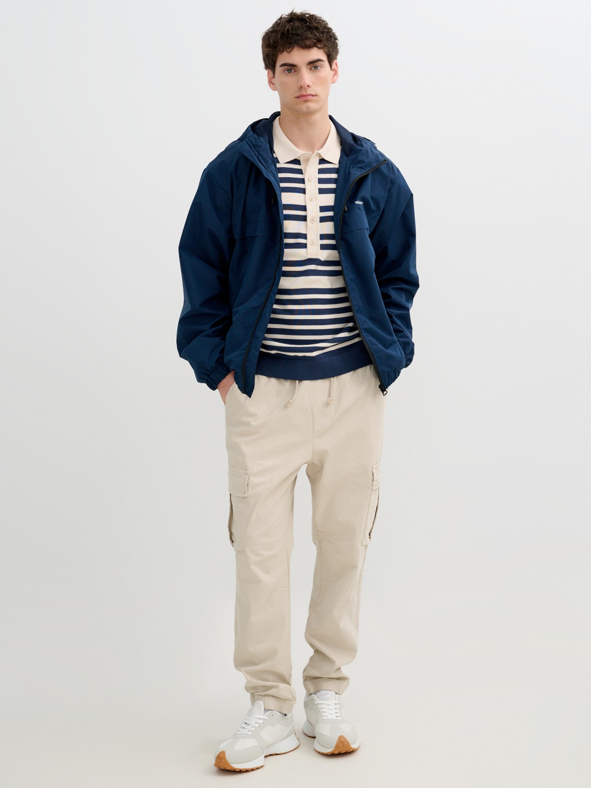 Light jacket with hood and zipper petrol blue front view