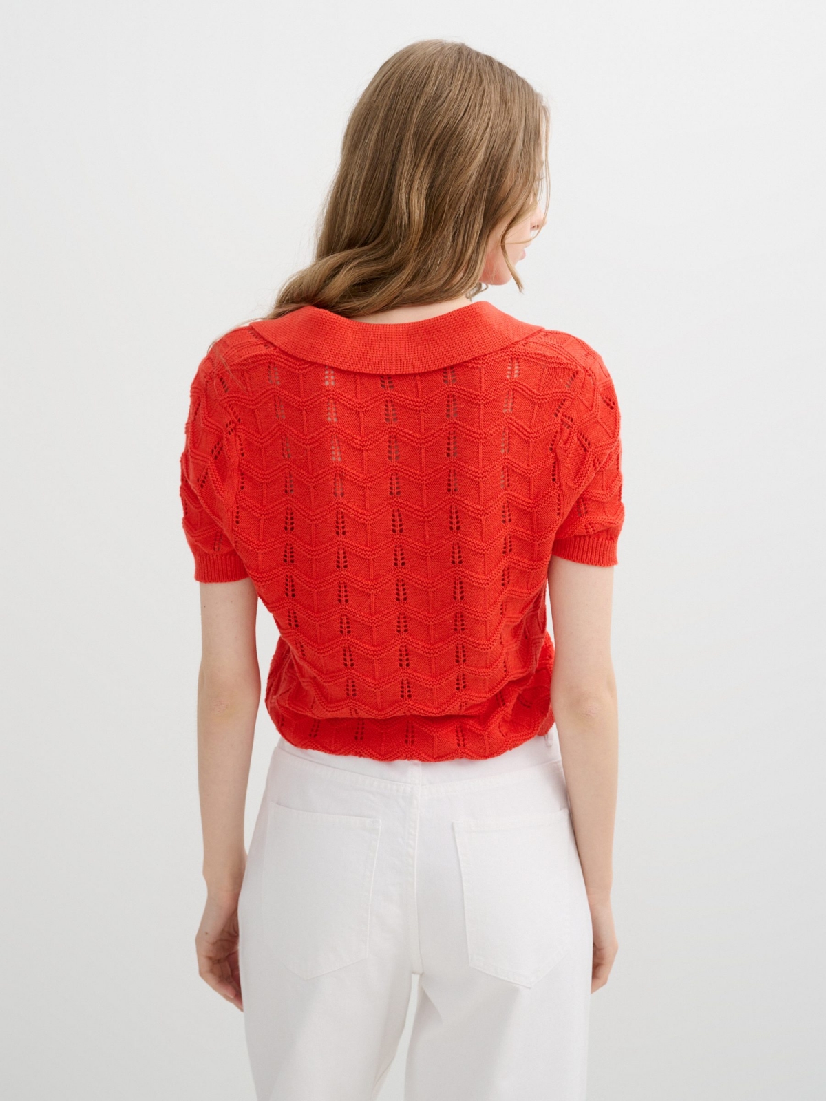 Jersey cuello polo ochos coral vista media trasera