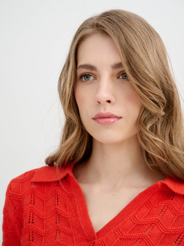 Polo neck cable knit jersey coral detail view