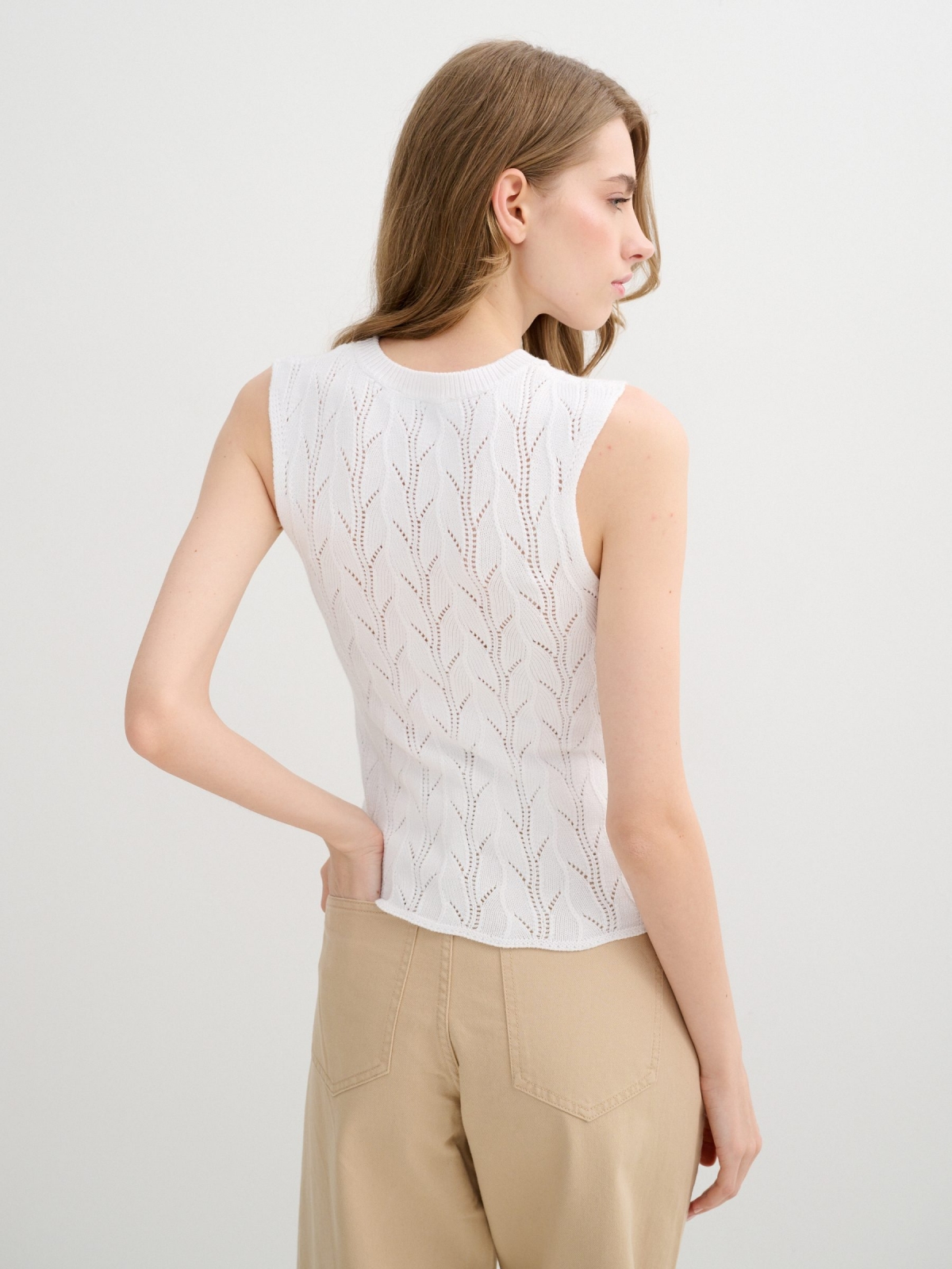 Sleeveless knit top with openwork white middle back view