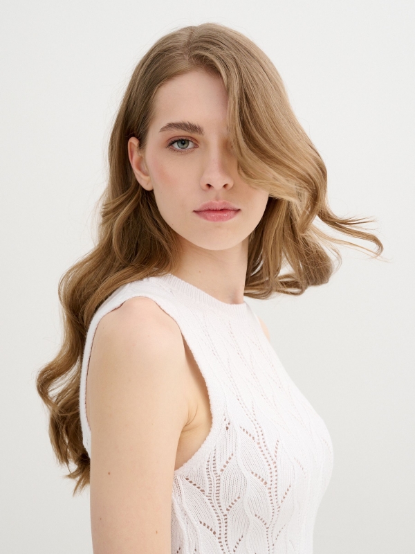Sleeveless knit top with openwork white detail view