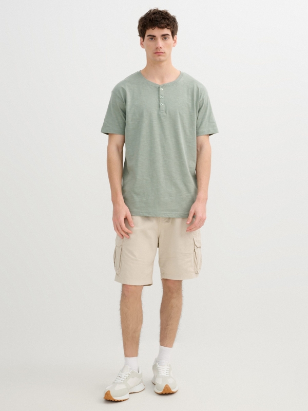 Flame t-shirt with henley collar green front view