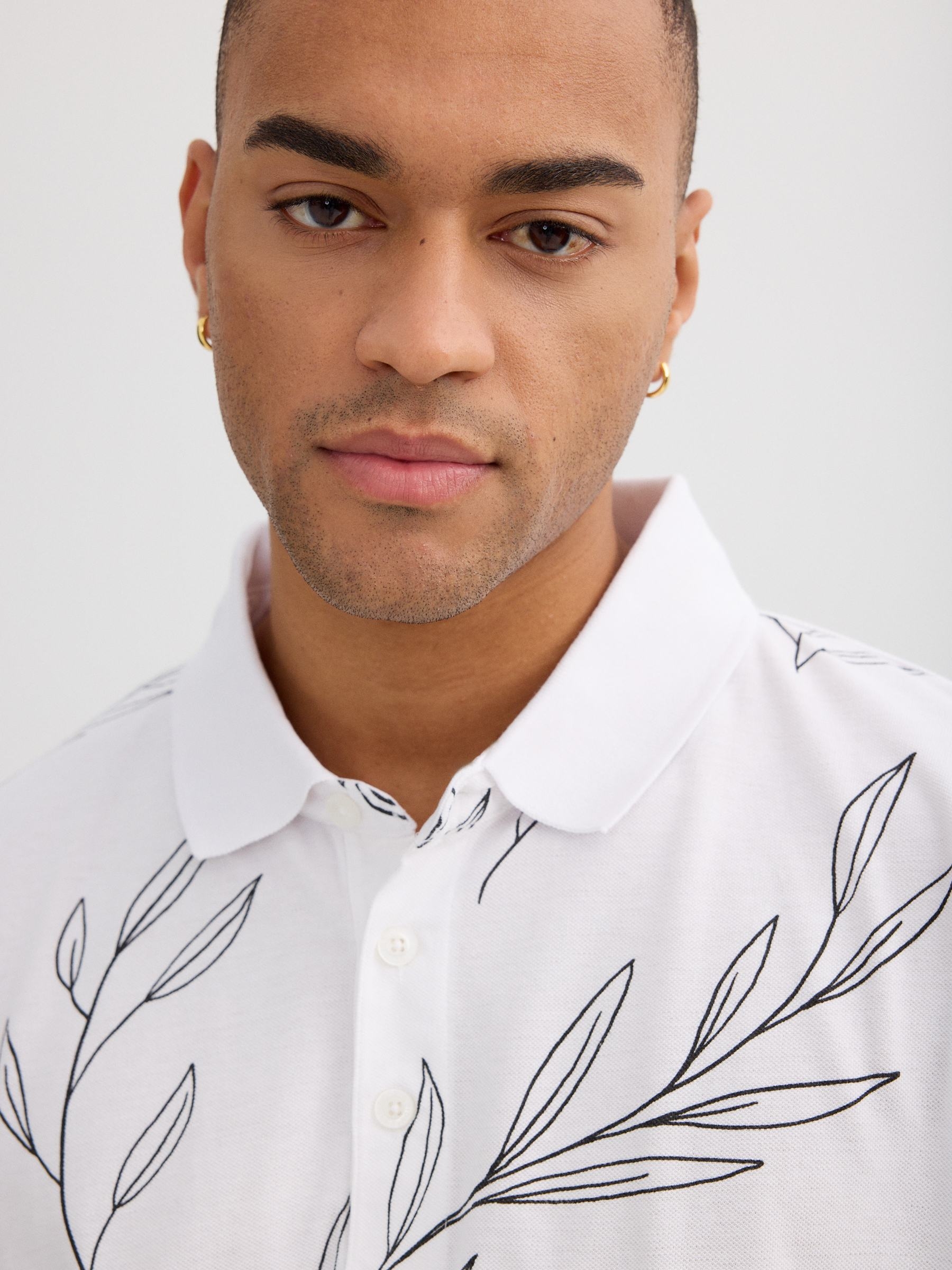 Piqué polo tropical leaves