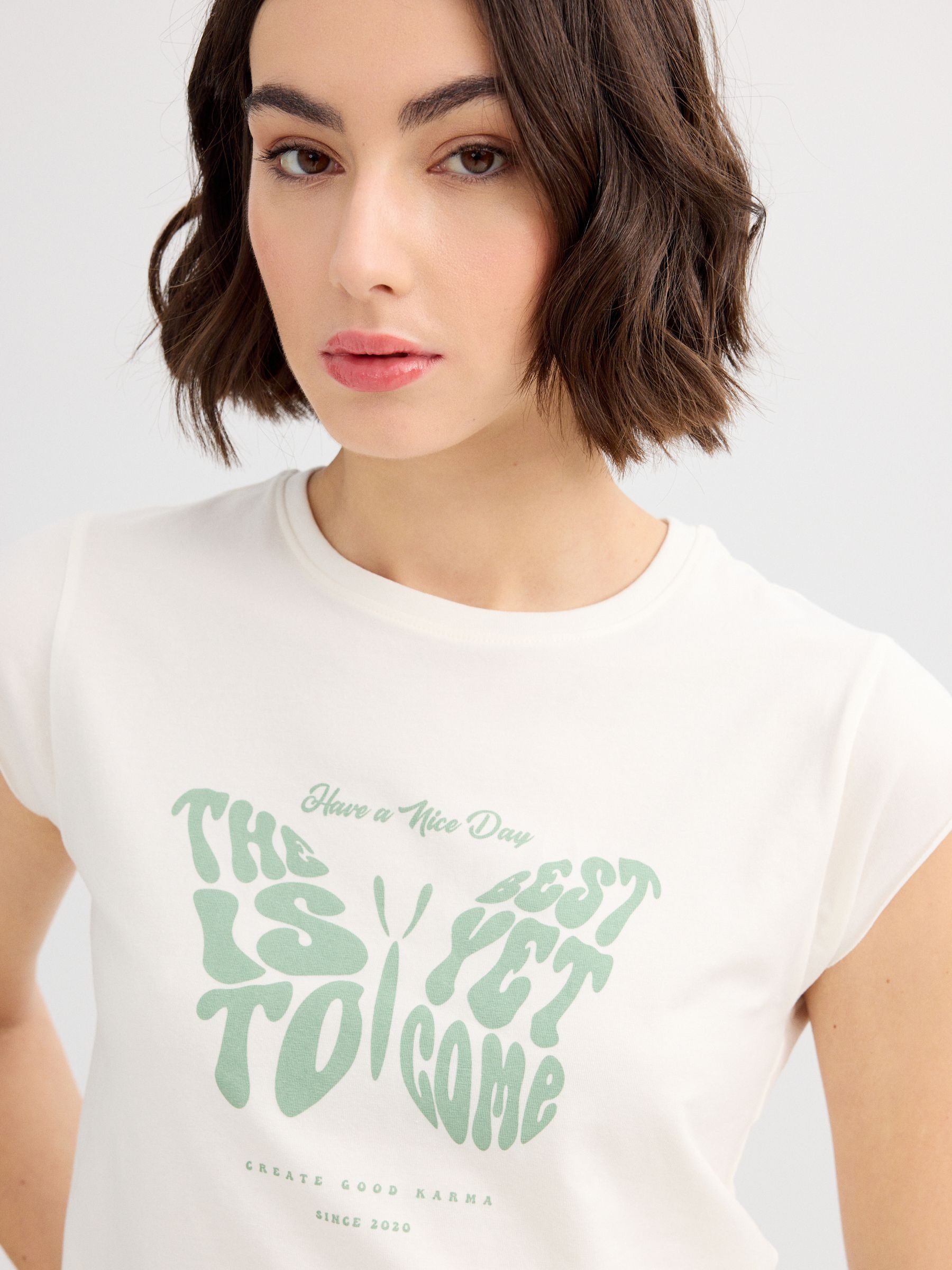 Camiseta crop the best off white vista meia frontal