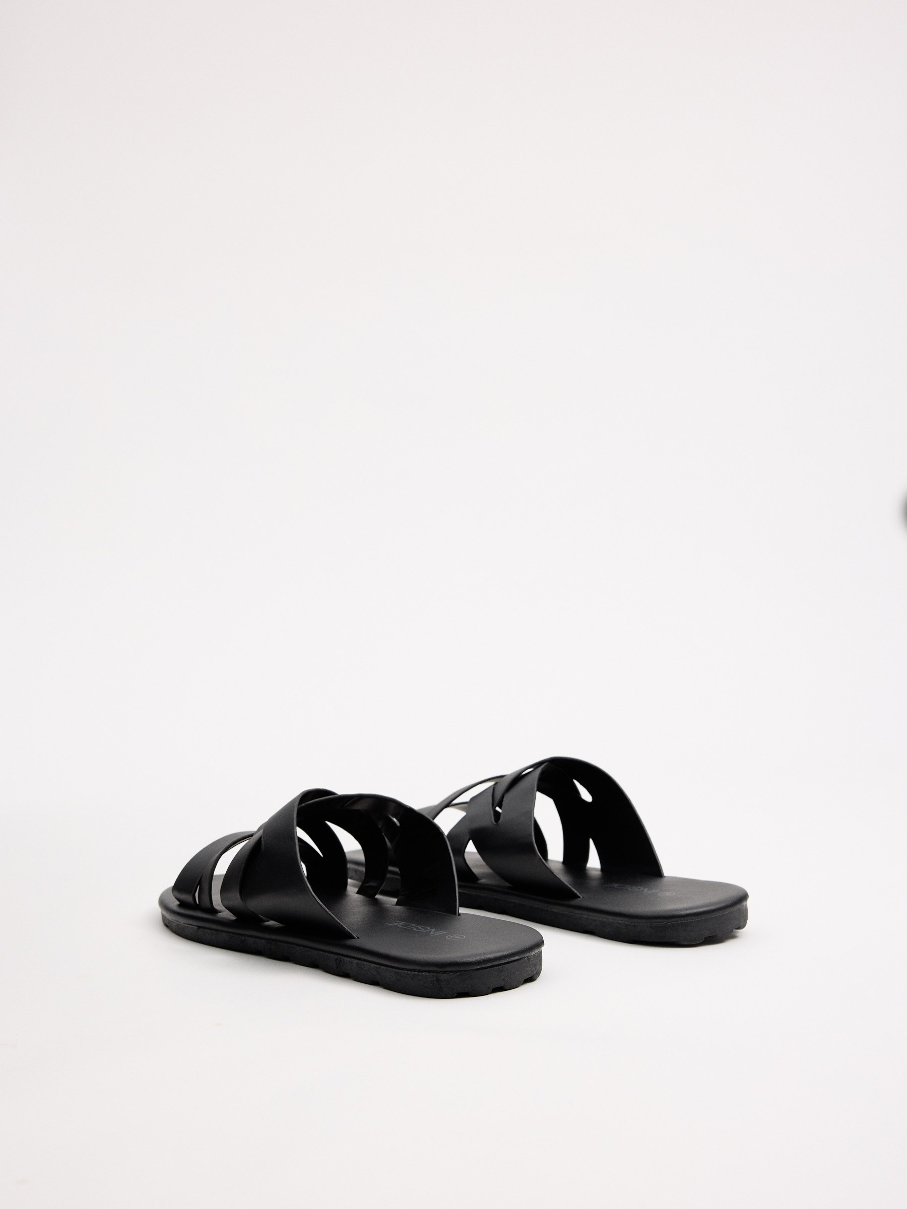 Cross-strap sandals black profile view