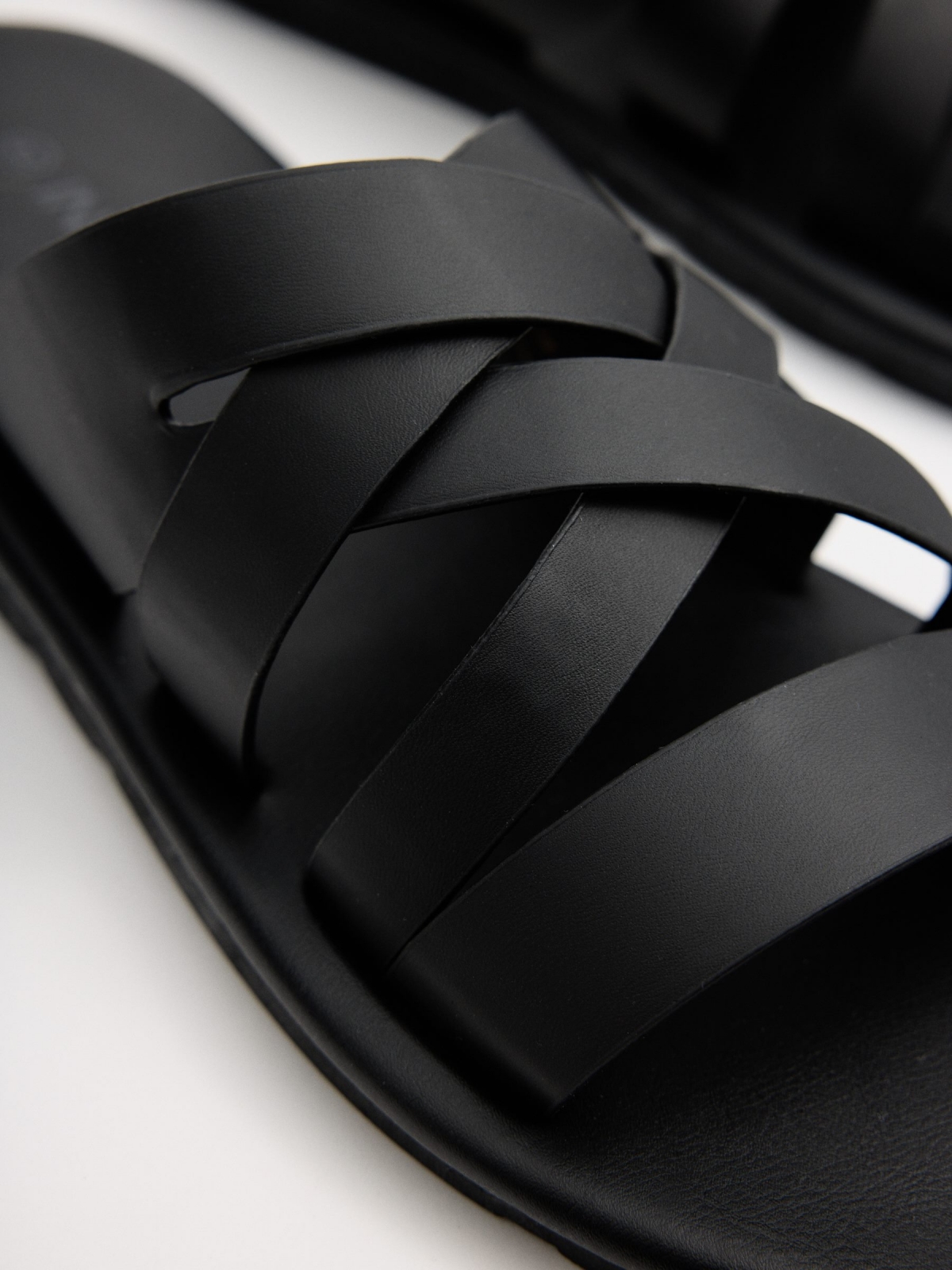 Cross-strap sandals black detail view