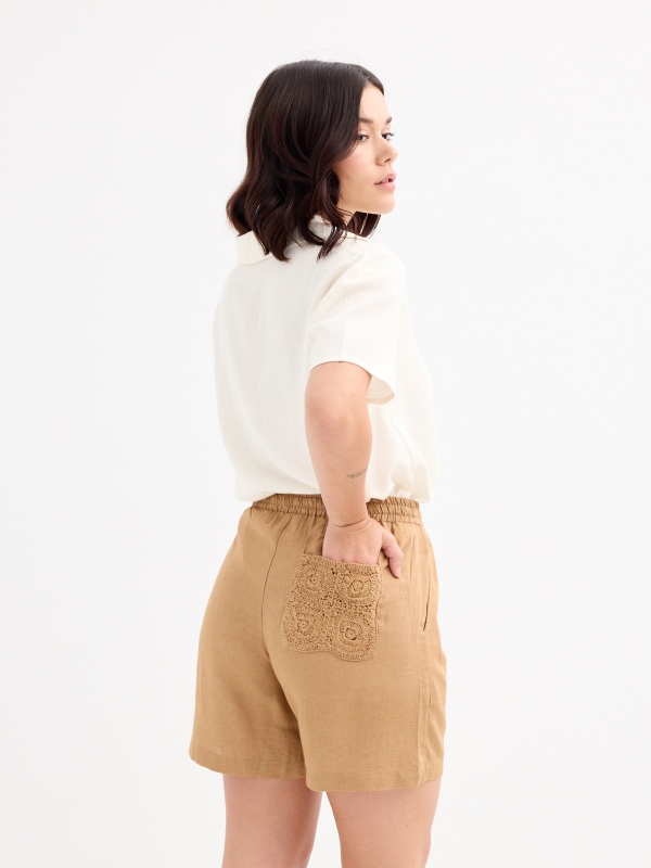 Fluid Bermuda shorts with crochet pocket taupe middle back view
