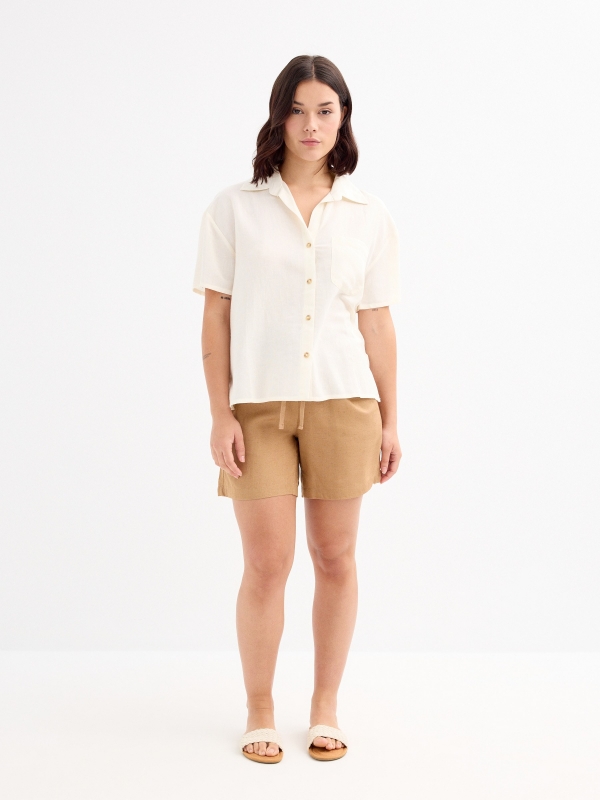 Fluid Bermuda shorts with crochet pocket taupe front view