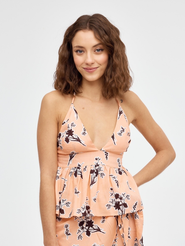 Top blouse tied at the neck peach middle front view