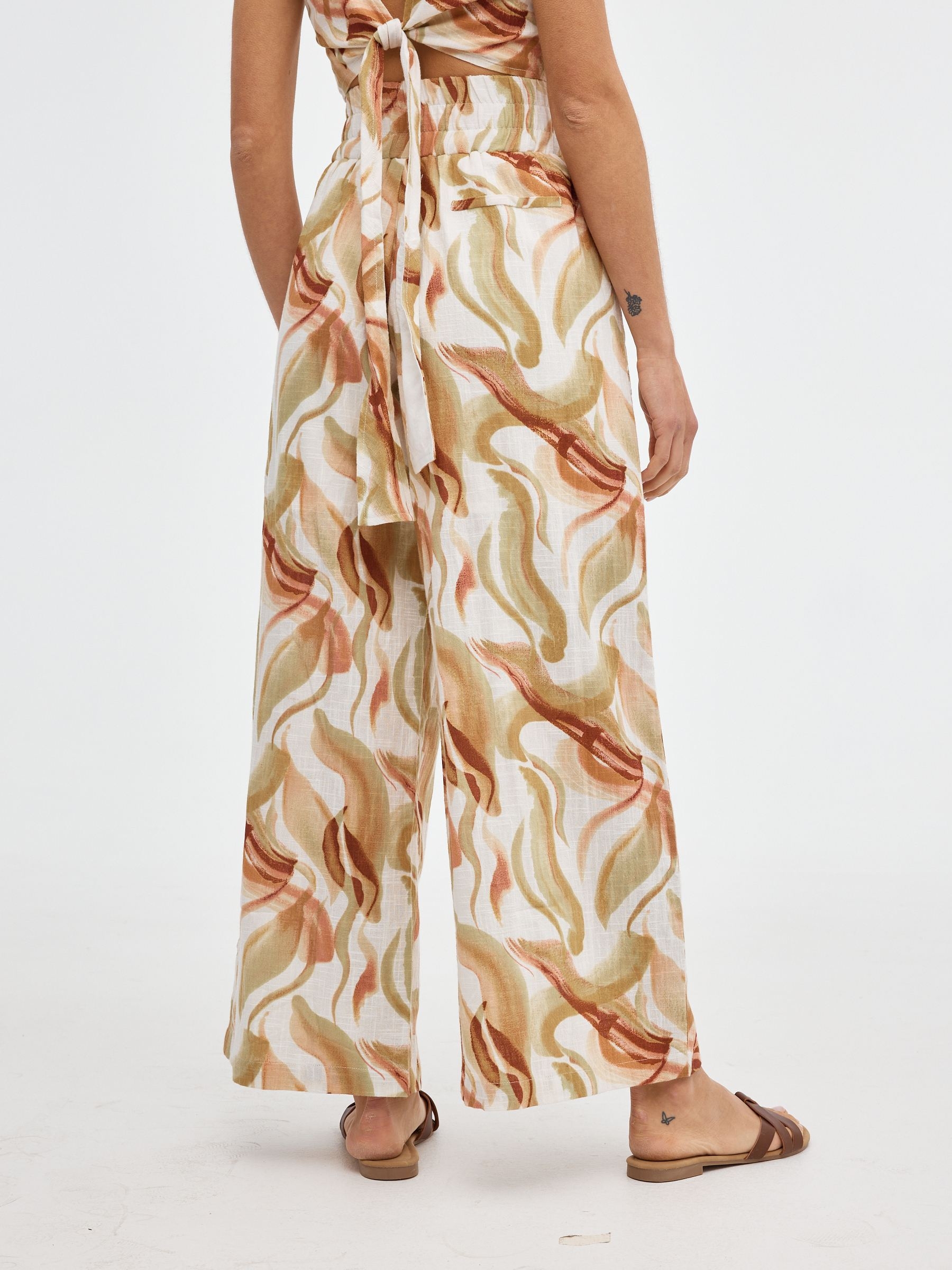 Pantalón wide-leg estampado beige vista general frontal