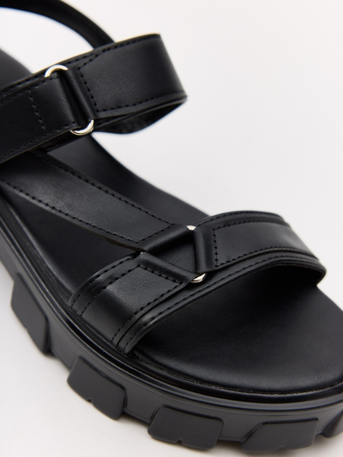 Platform track sandal black 45º back view