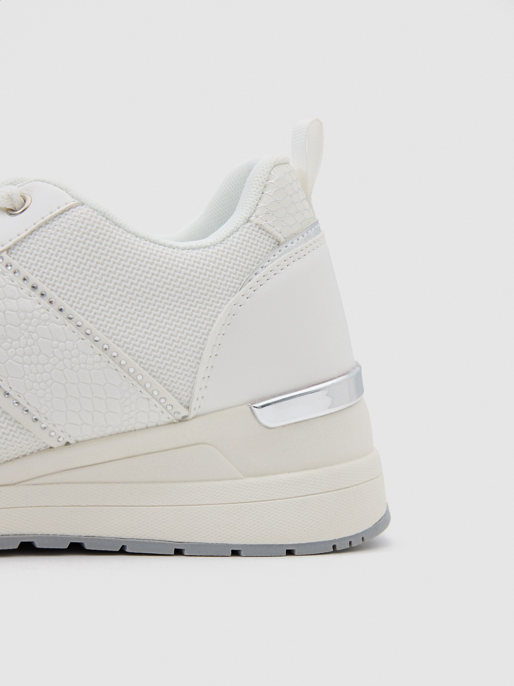 Wedge sneaker with glitter details