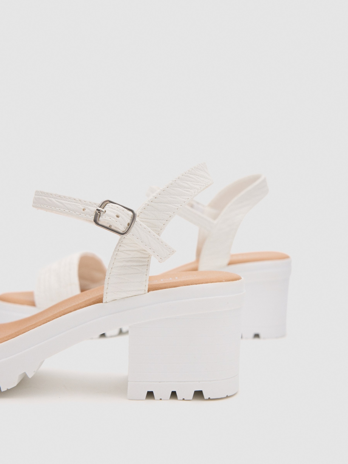 Track heel sandal white detail view