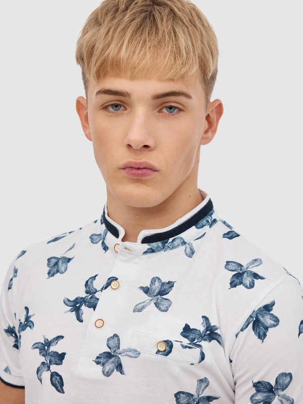 Tropical print polo white detail view