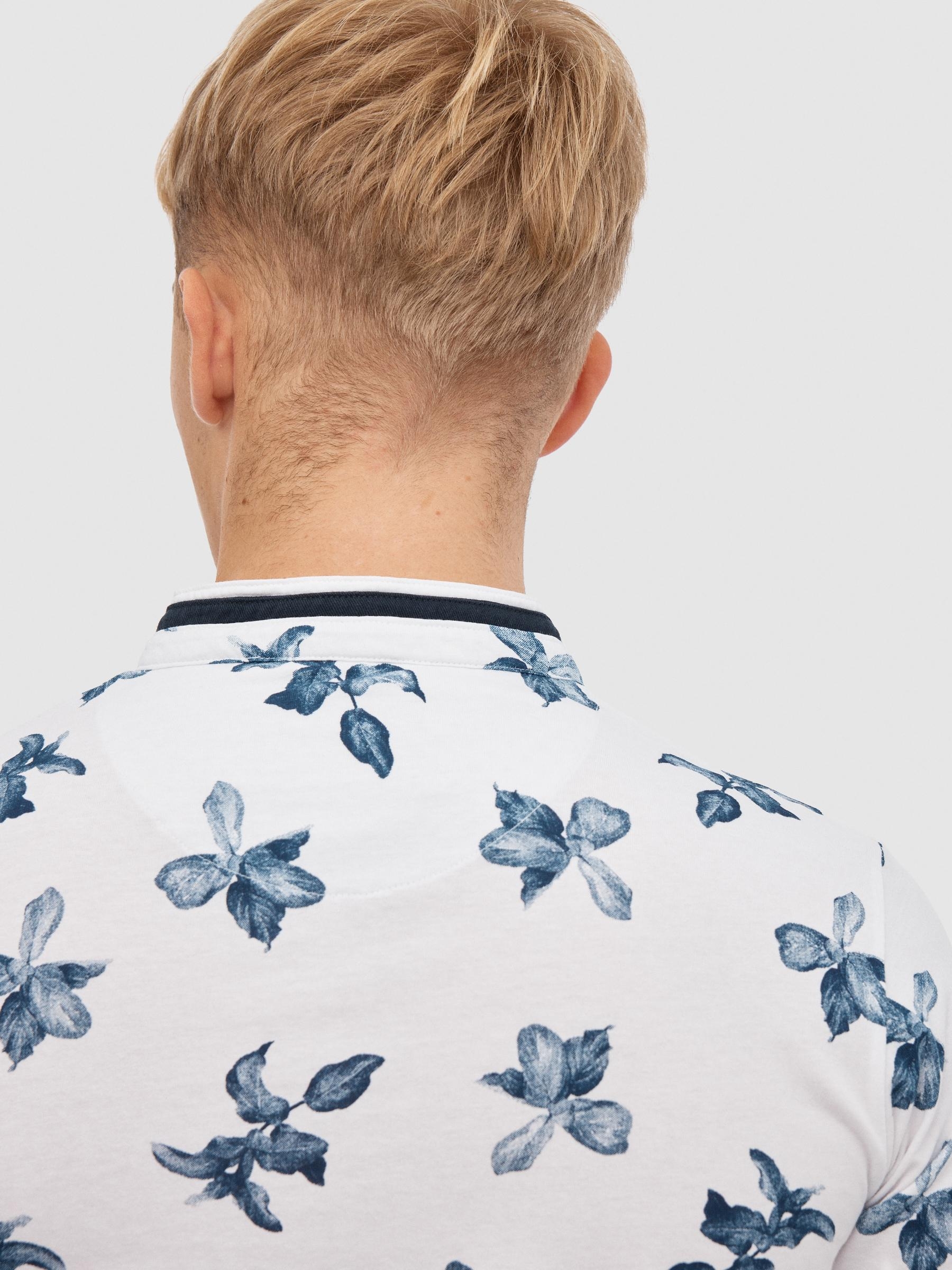 Tropical print polo white middle front view