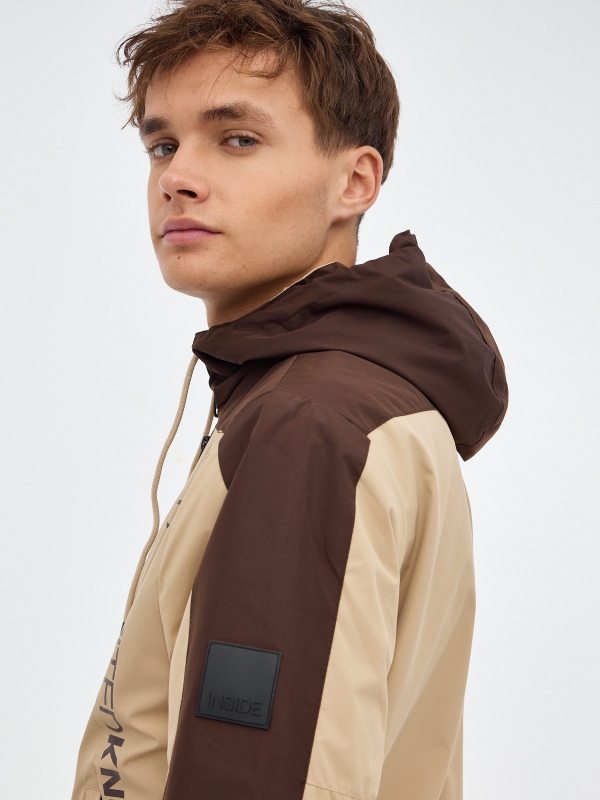 Jacket with hood sand detail view